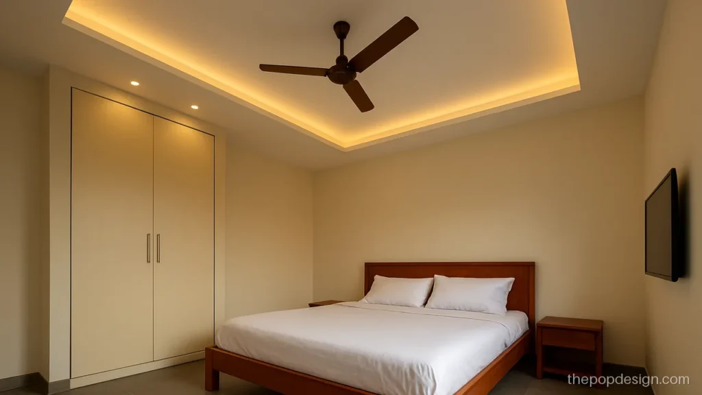 Simple bedroom POP ceiling with an L shaped band over the wardrobe side