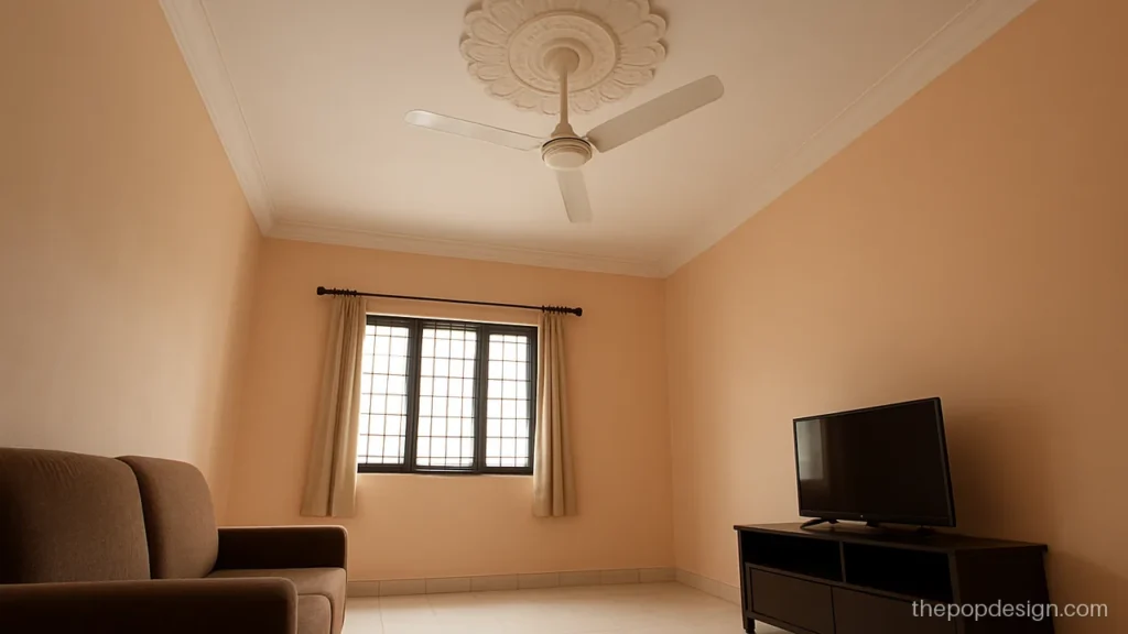 Readymade pop ceiling design rose fixed around a fan in a hall