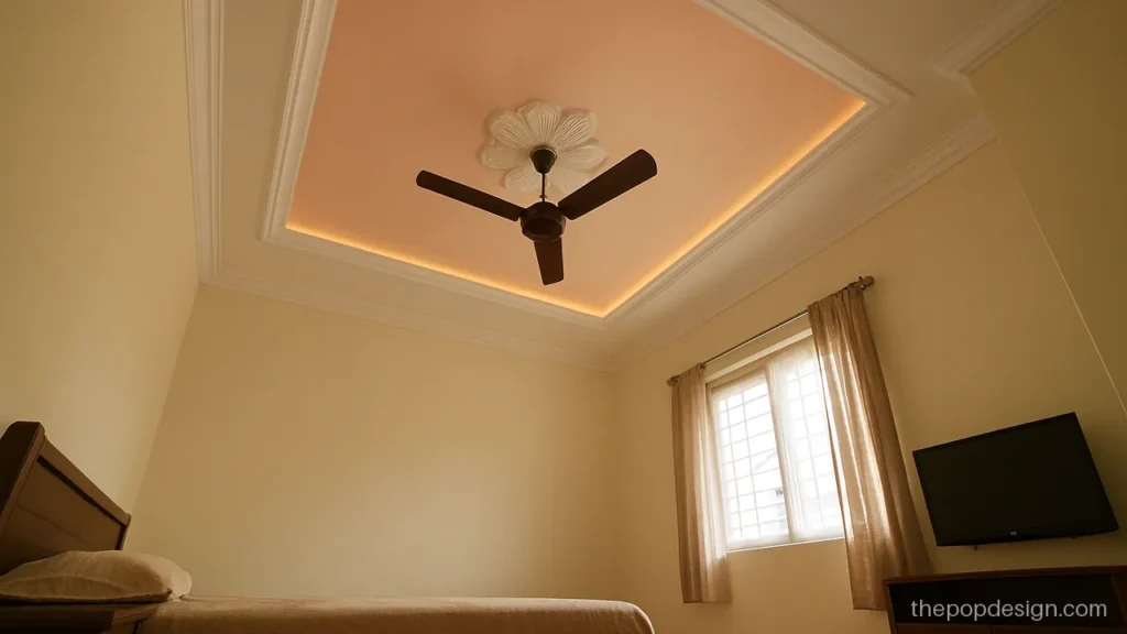 Peach POP ceiling with a white flower medallion in the centre