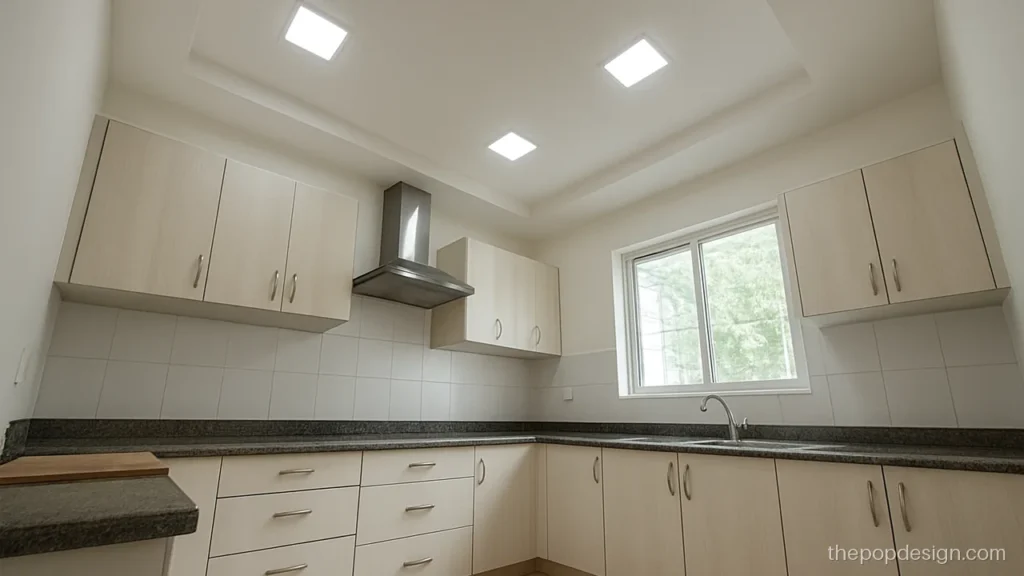 Simple kitchen POP design with a flat border and bright panel lights