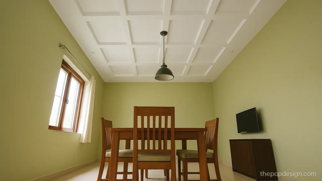 Plus minus grid of small squares in a POP ceiling over a dining area