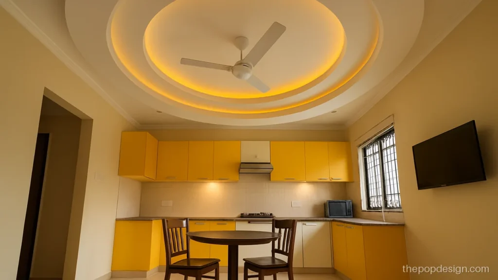 Kitchen pop design with fan in plus minus rings over the dining corner