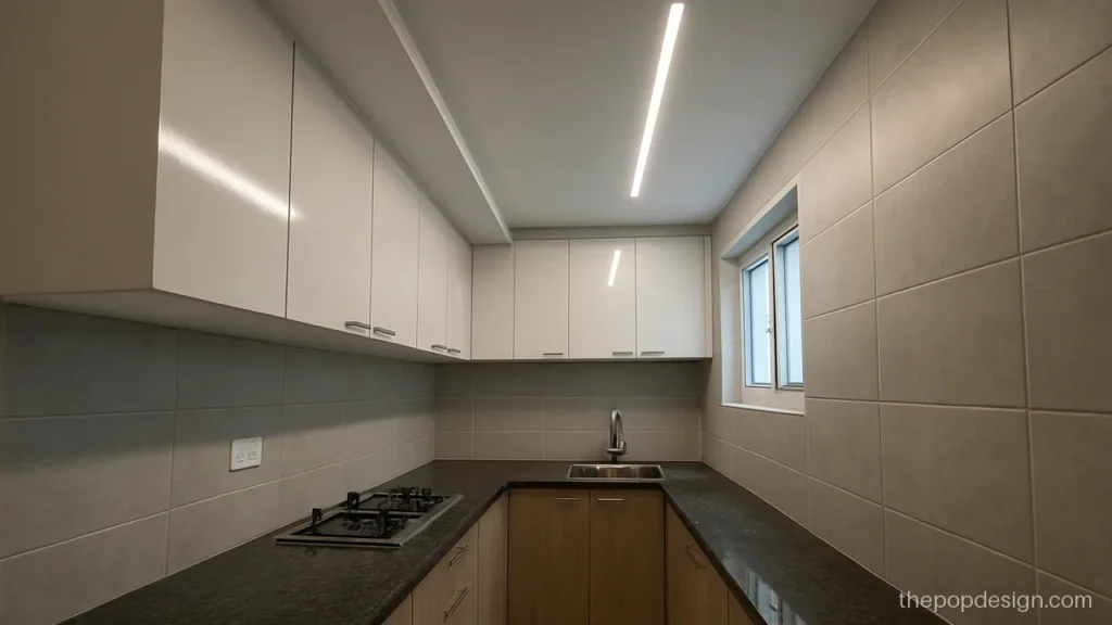 Small kitchen POP design with a narrow straight border and one tube light line